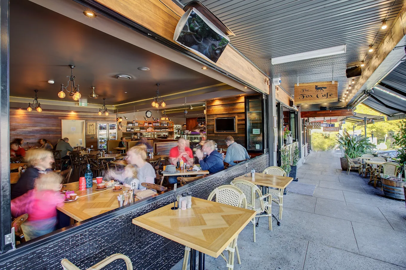 The Fox Cafe’s open shopfront, timber tables and outdoor seating on Fox Valley Road